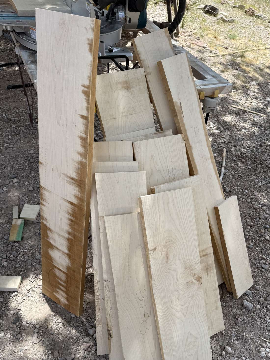 Milled lumber staged outdoors in Sonoita, Arizona